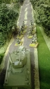 Help arrives, two Shermans silence the roadside defenders...